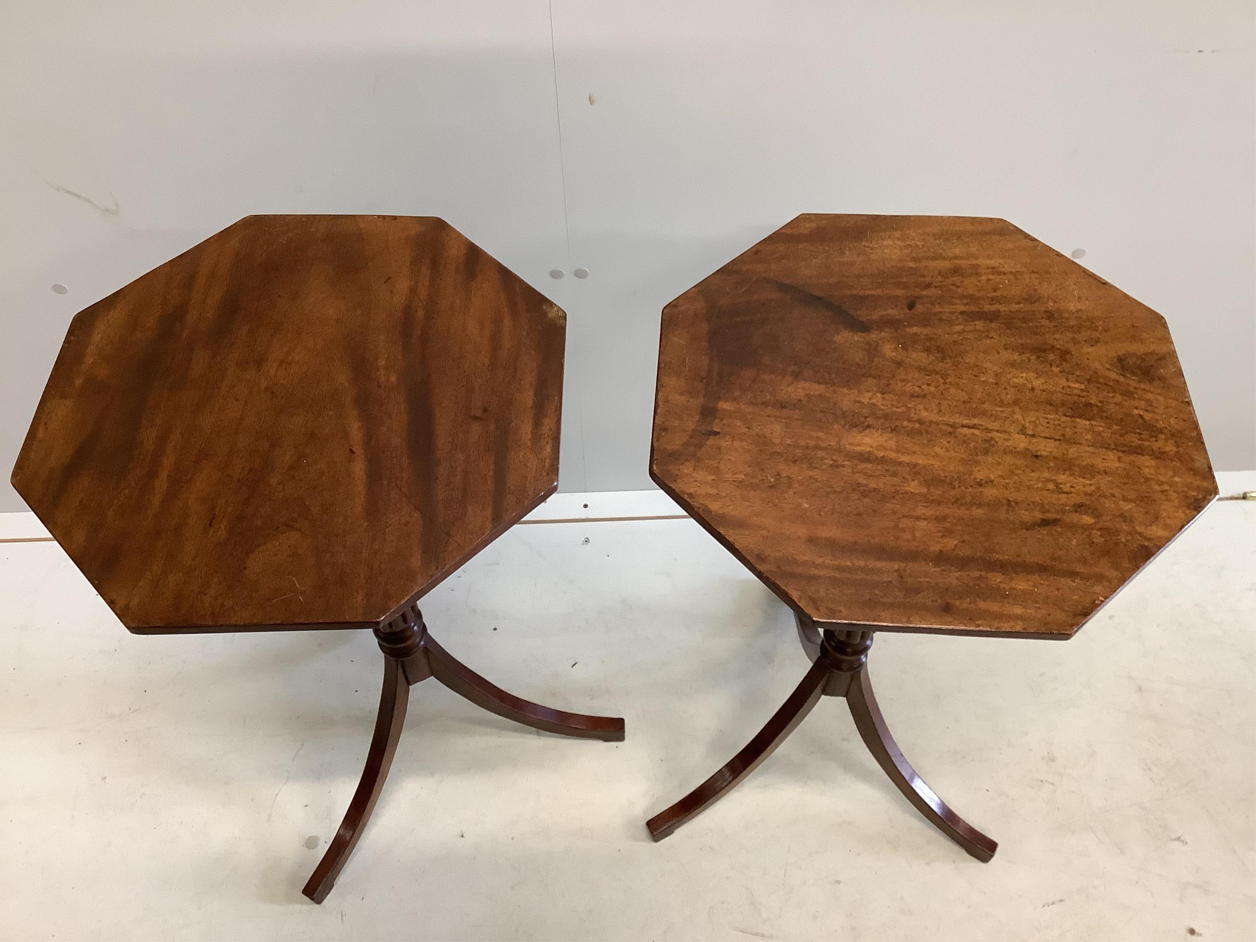 A pair of Regency style octagonal mahogany tripod wine tables, width 41cm, height 71cm